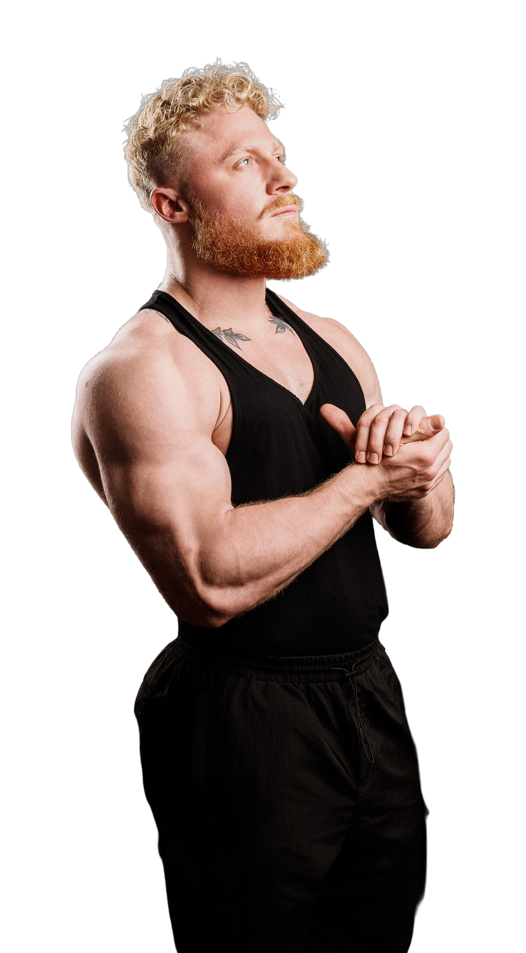Coach Kobey Silver looking left in a black training tank